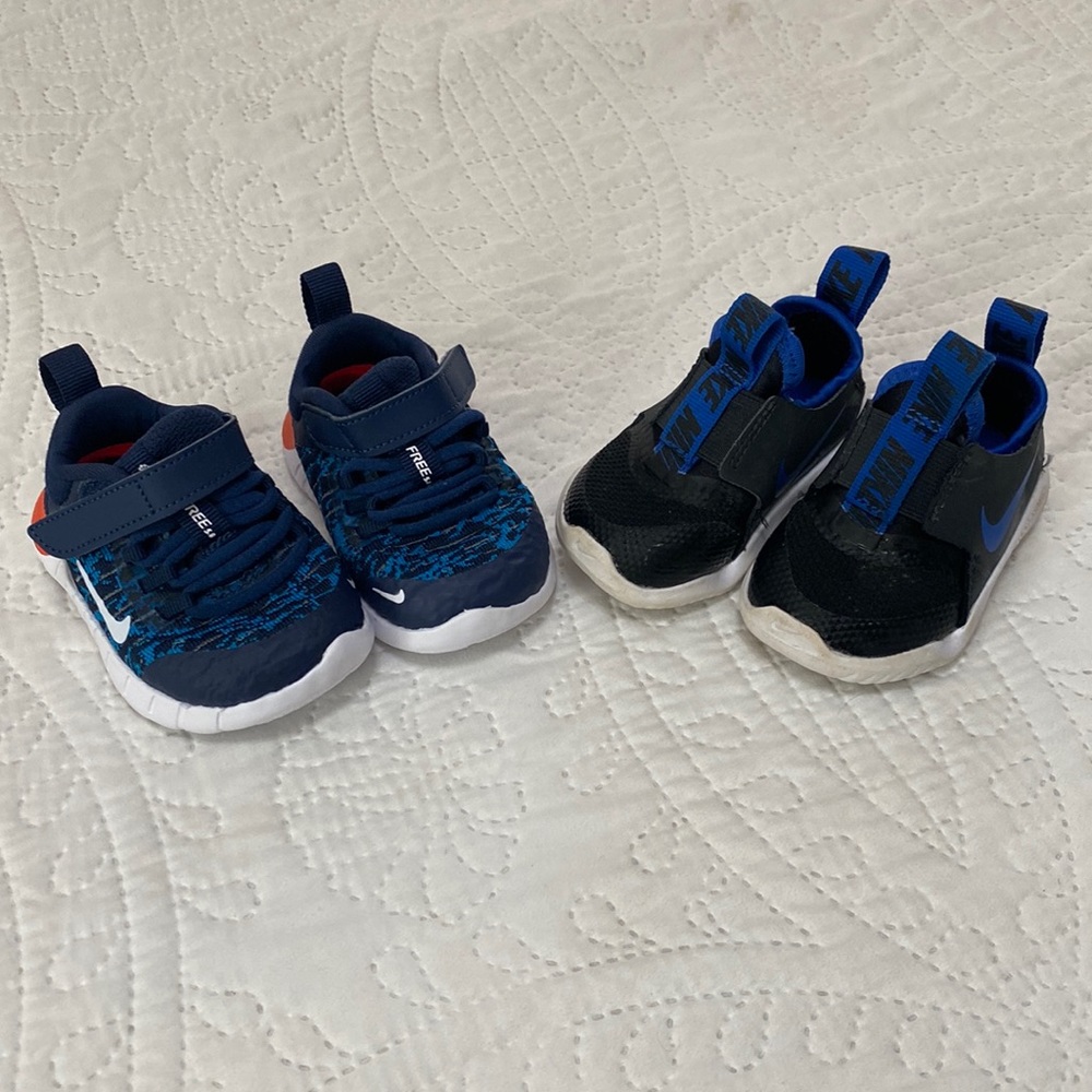 Two pairs for size 3c Nike shoes
